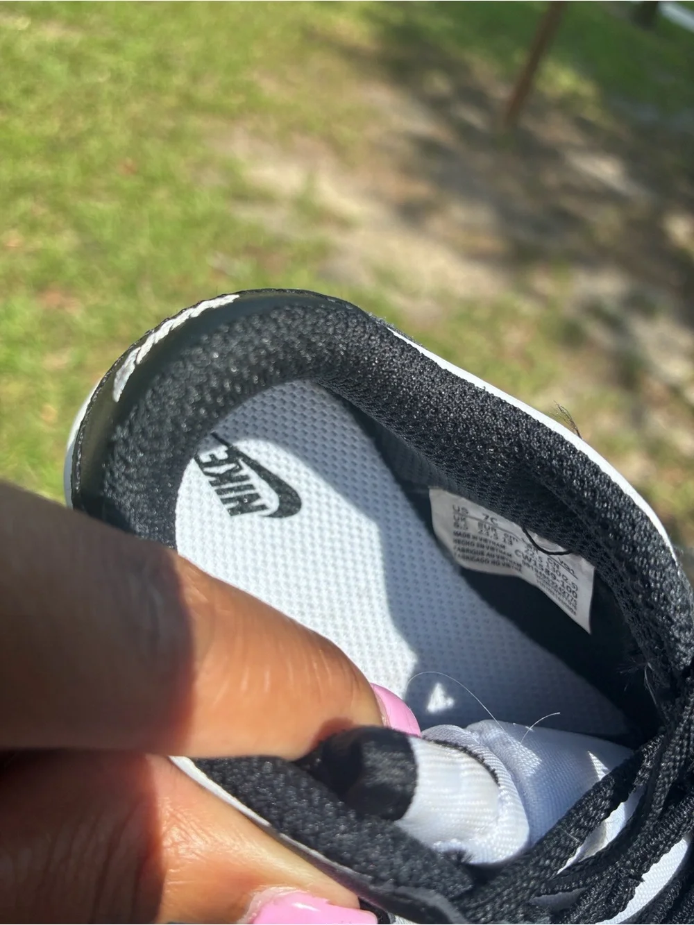 Nike Kids Black and White Low-Top Sneaker